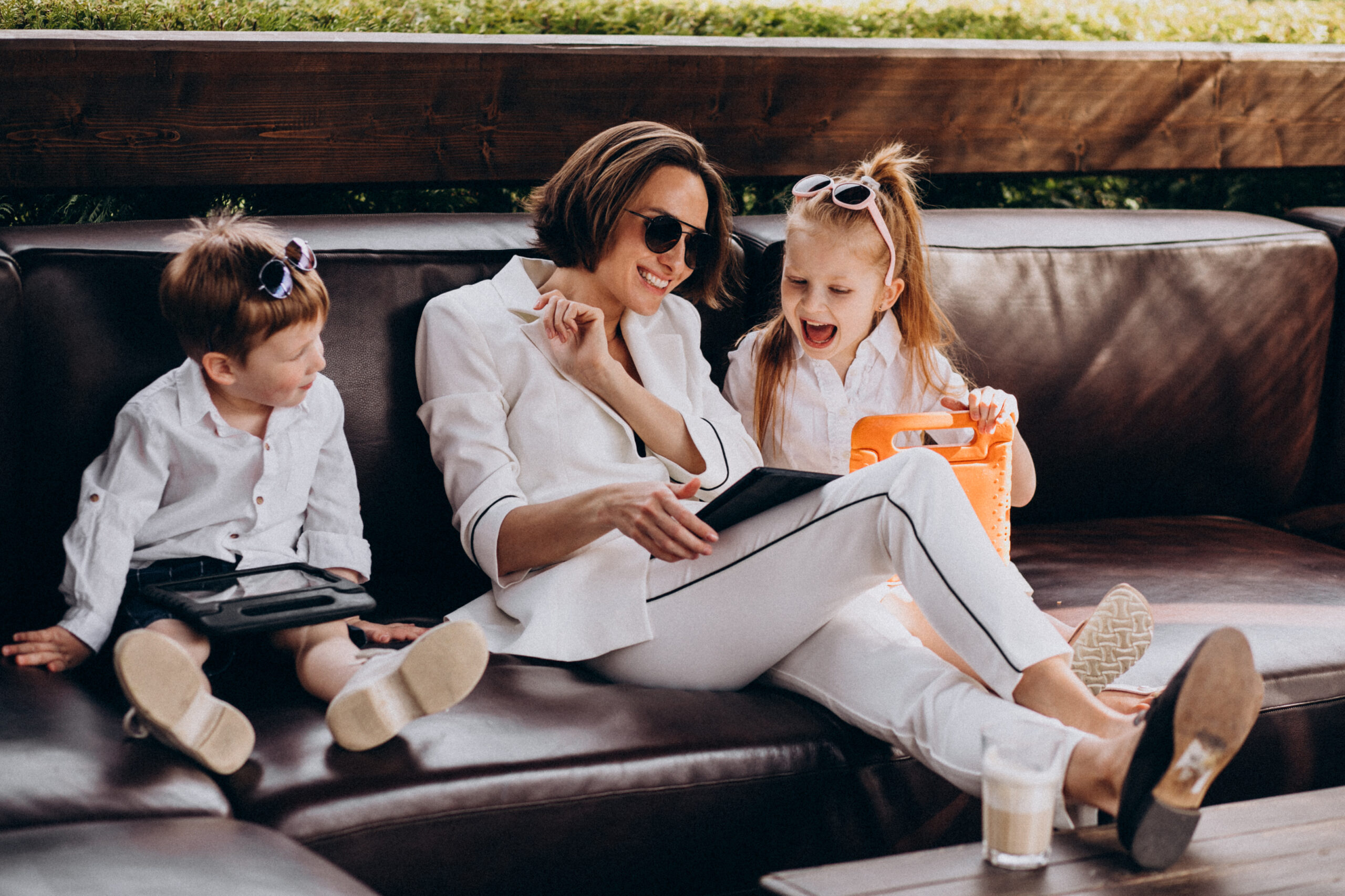 Business woman mother working from home with kids